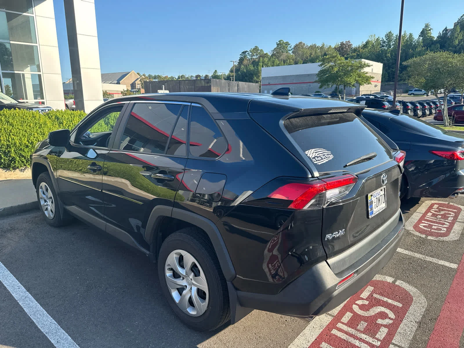 Used 2024 Midnight Black Metallic Toyota LE image 3
