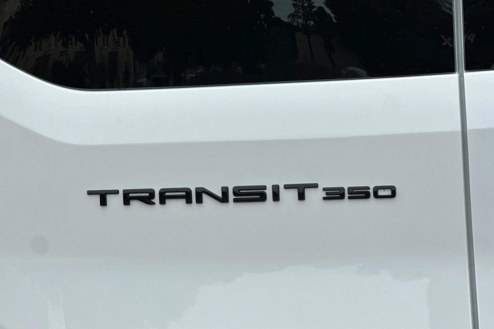 New 2026 Oxford White Ford Passenger Van XLT image 23