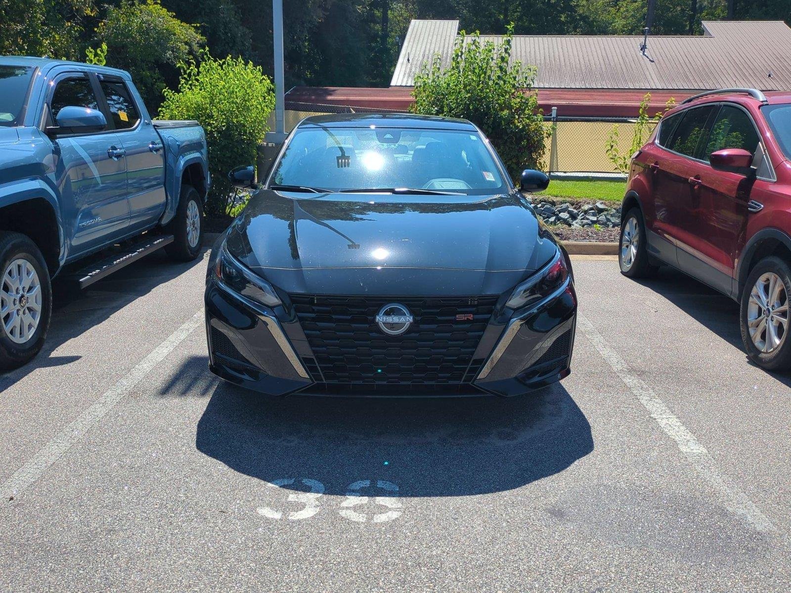 Used 2025 Super Black Nissan SR image 2
