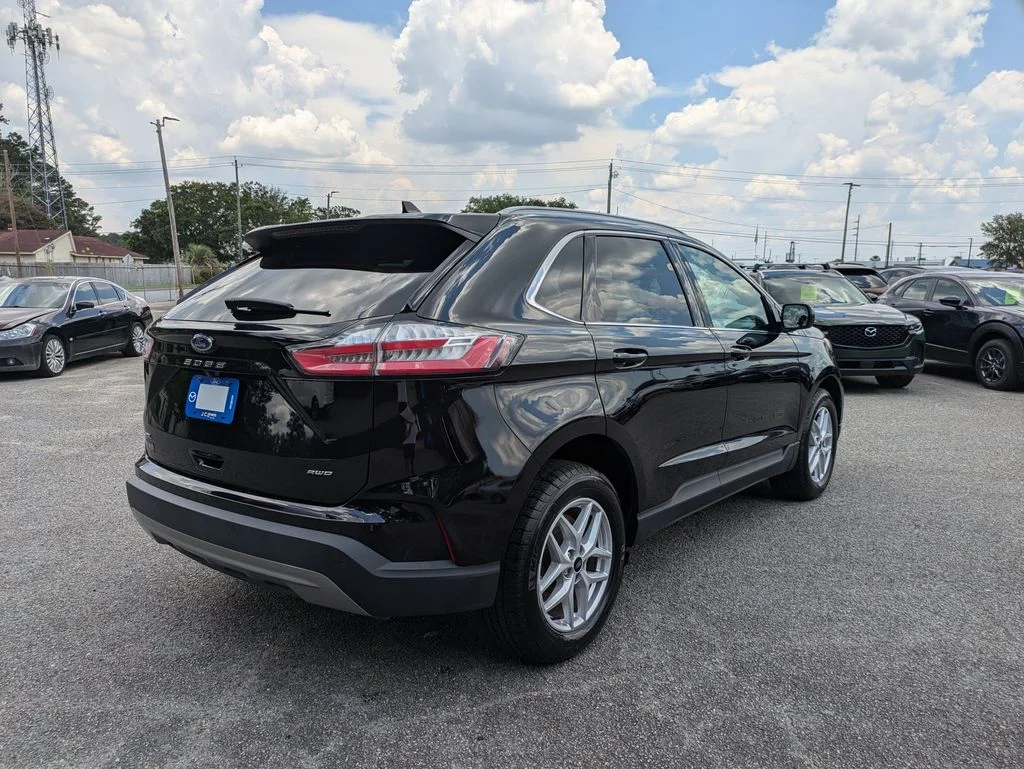 Certified Used 2024 Agate Black Metallic Ford SEL image 4