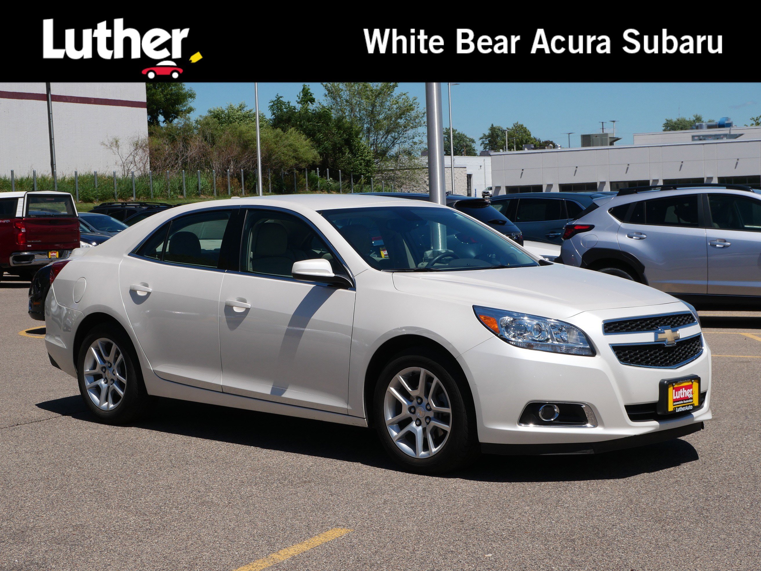 Used 2013 White Diamond Tricoat Chevrolet ECO image 1
