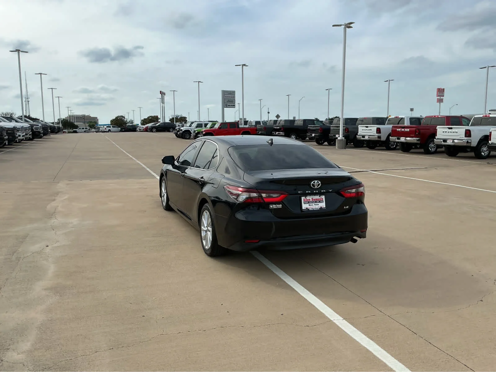 Used 2023 Midnight Black Metallic Toyota LE image 9