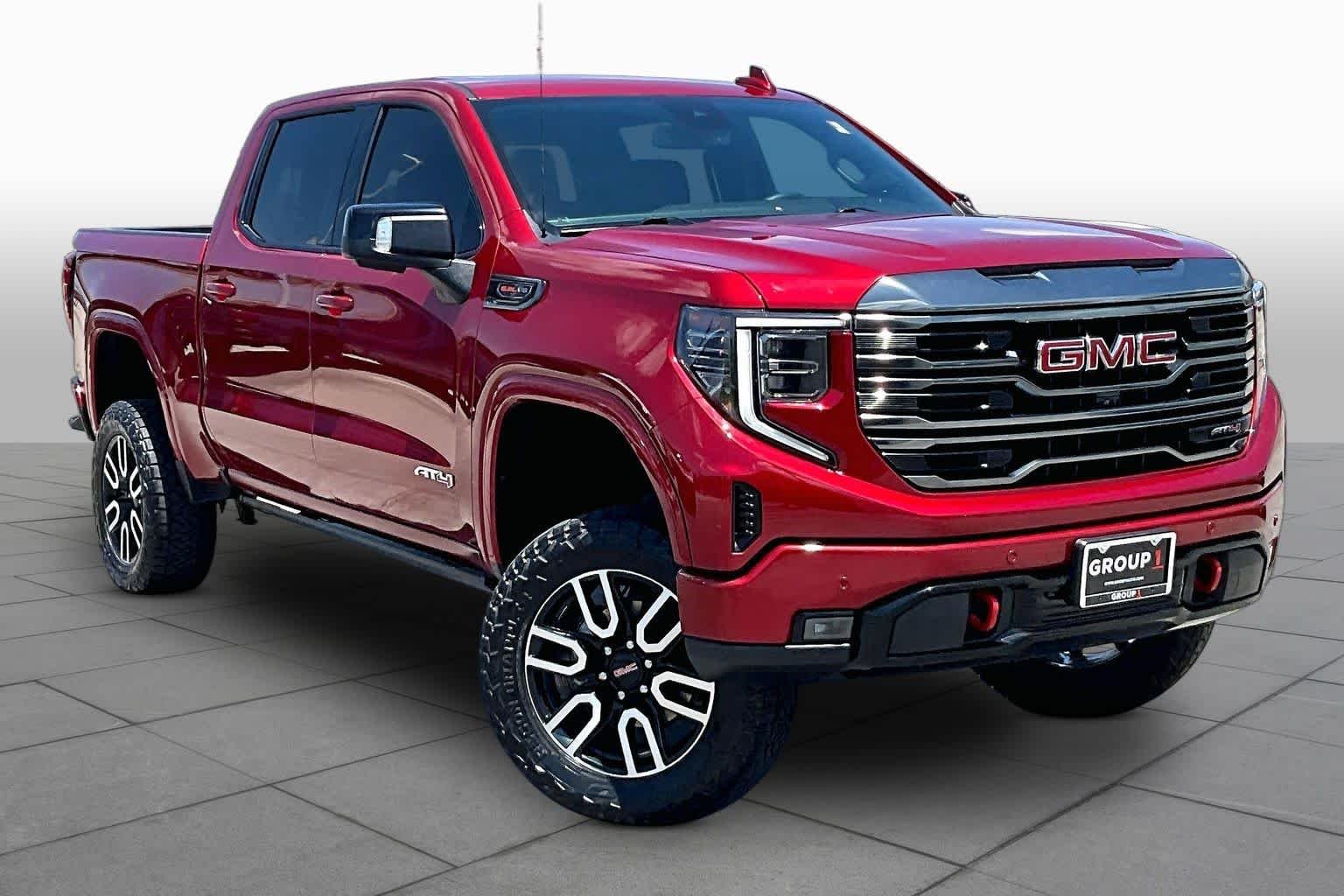 Used 2023 Volcanic Red Tintcoat GMC AT4 image 3
