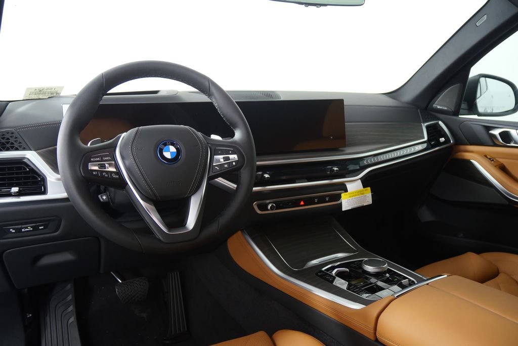 Used 2026 Mineral White Metallic BMW xDrive50e image 18