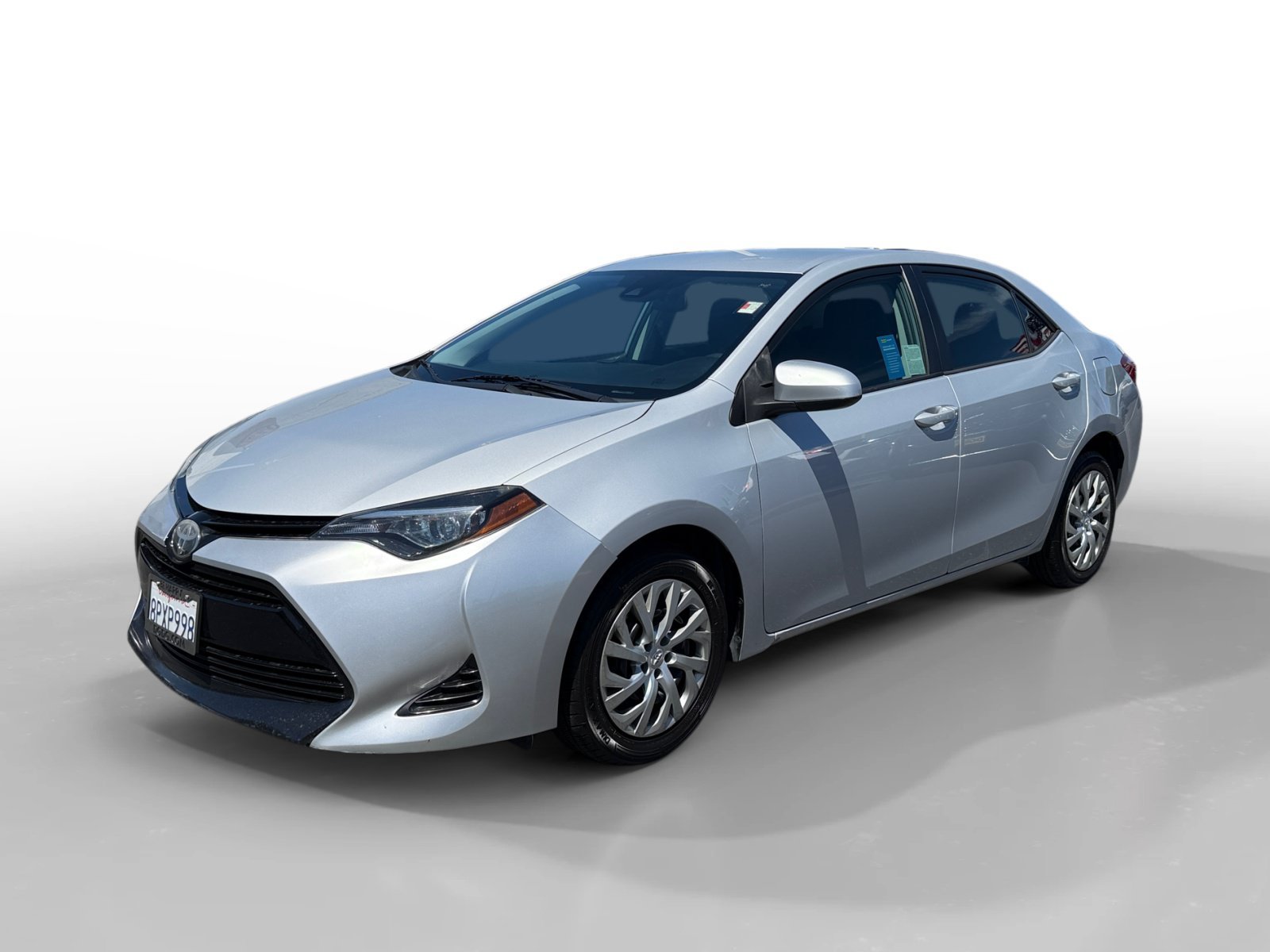 Used 2018 Classic Silver Metallic Toyota LE image 1