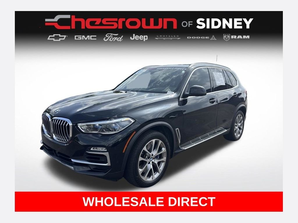 Used 2020 Black Sapphire Metallic BMW xDrive40i image 1