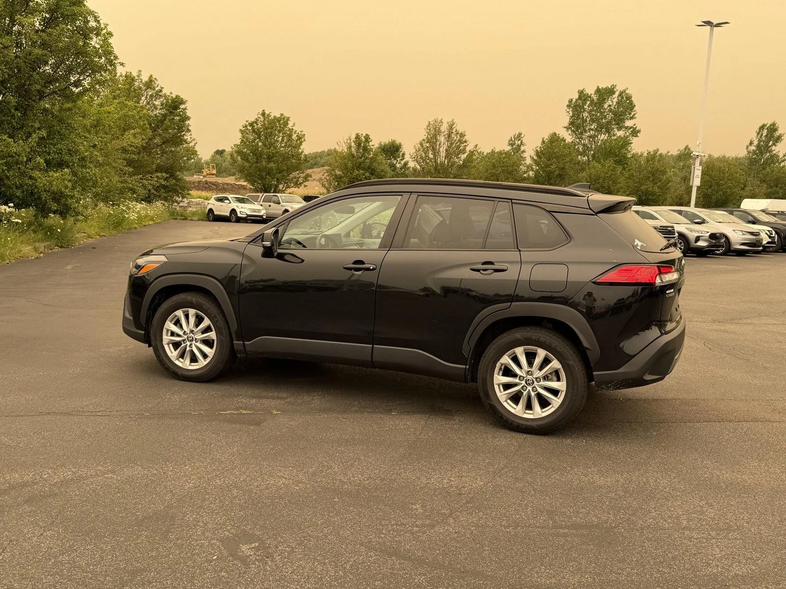Used 2023 Jet Black Toyota LE image 5