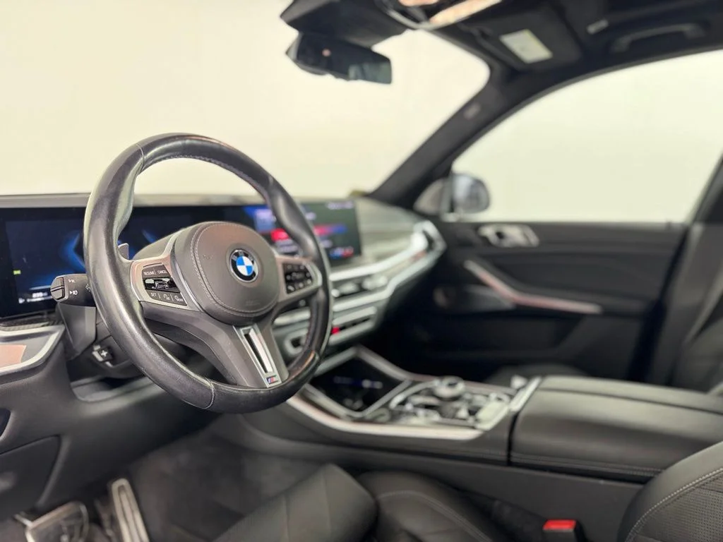 Certified Used 2024 Black Sapphire Metallic BMW M60i image 14