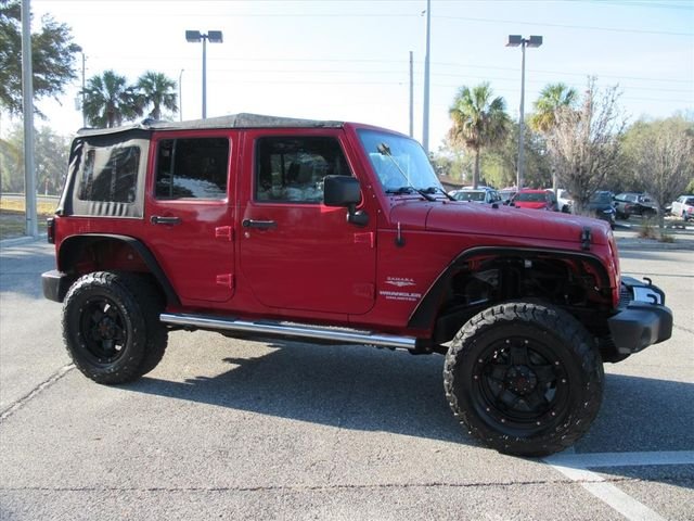 Used 2010 Jeep Wrangler Unlimited Sahara with VIN 1J4HB5H16AL186595 for sale in Mount Dora, FL