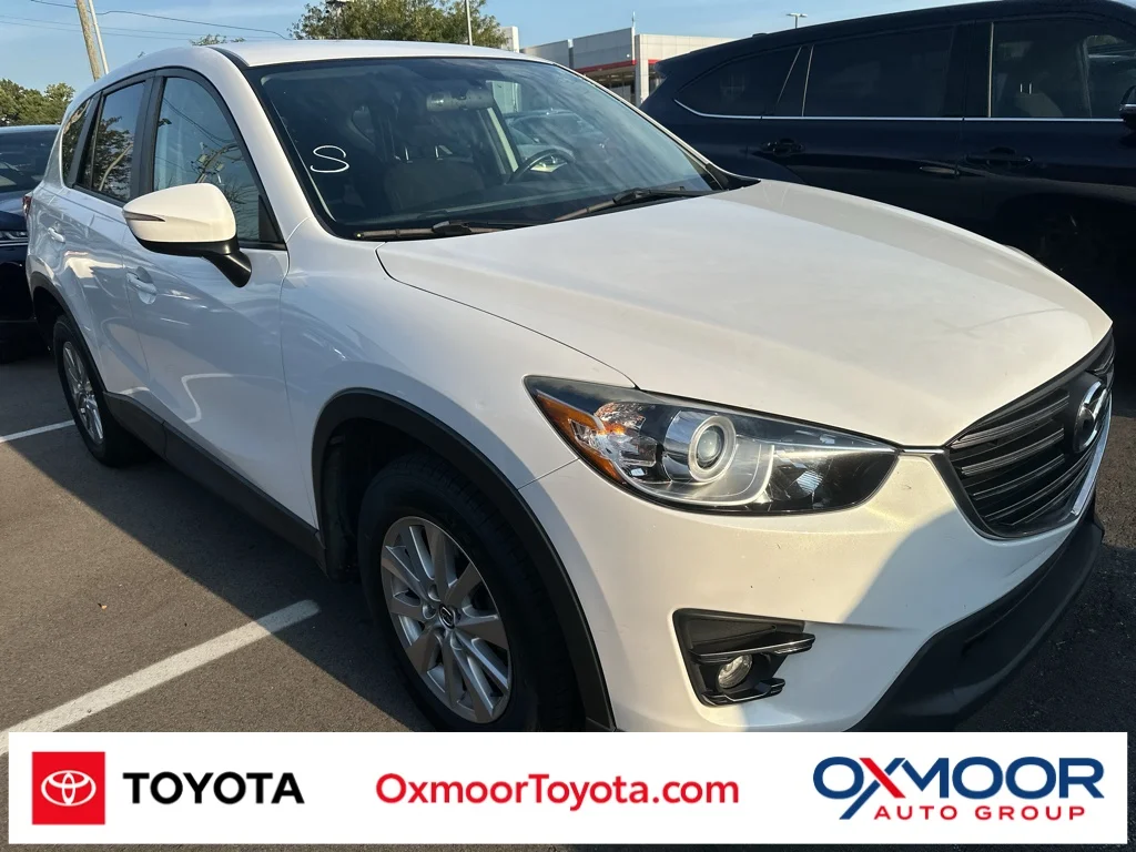 Used 2016 Crystal White Pearl Mica Mazda Touring image 1