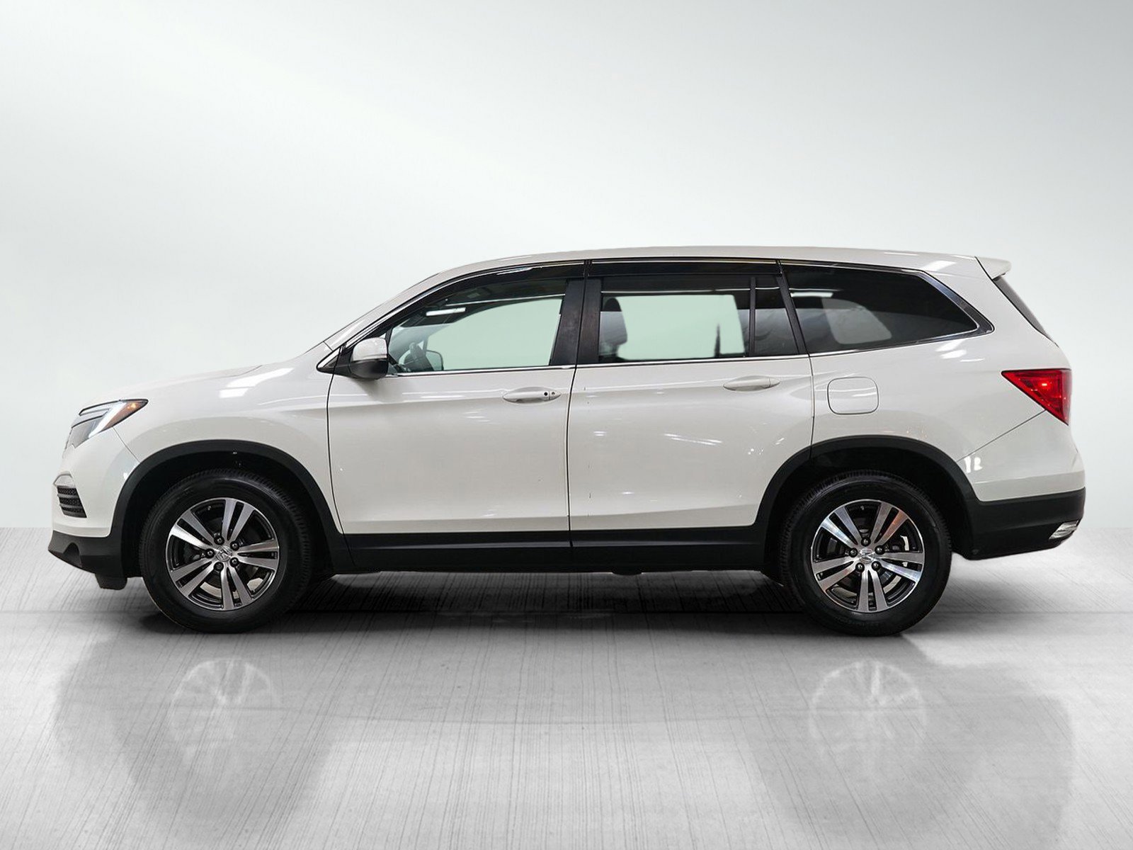 Used 2016 Honda Pilot EX-L with VIN 5FNYF6H51GB011718 for sale in Burnsville, Minnesota