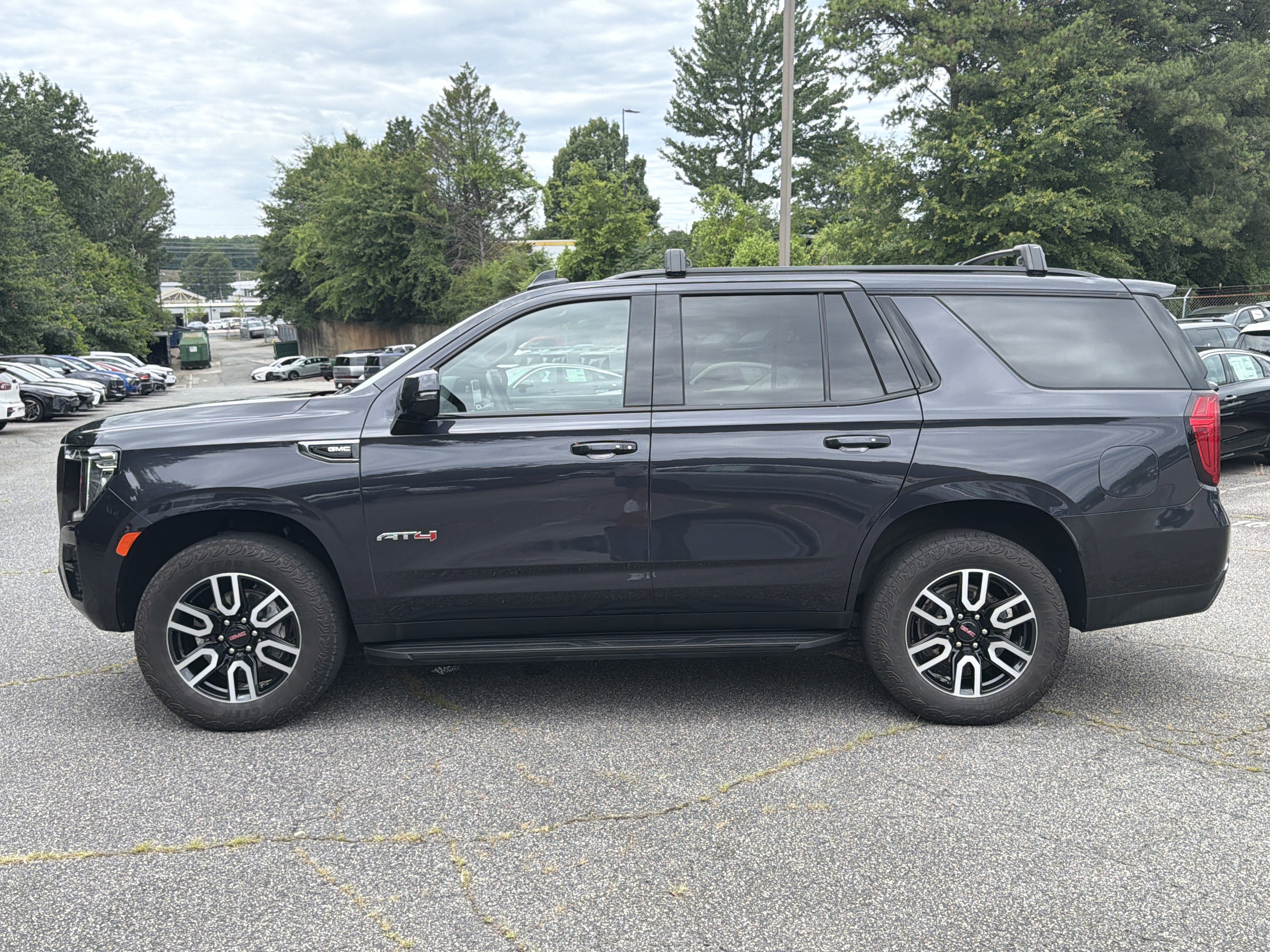 Used 2024 Titanium Rush Metallic GMC AT4 image 4