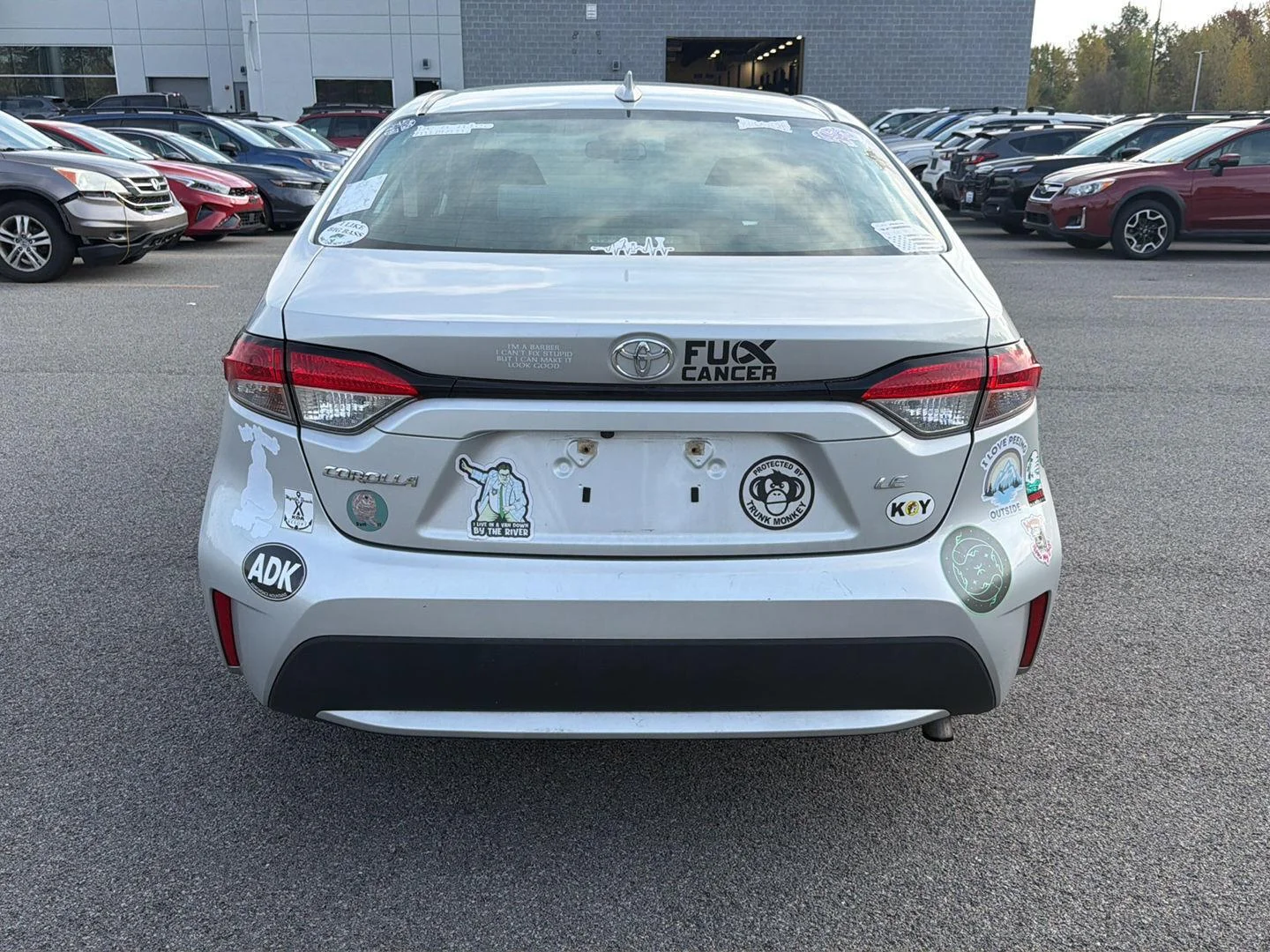 Used 2021 Classic Silver Metallic Toyota LE image 4