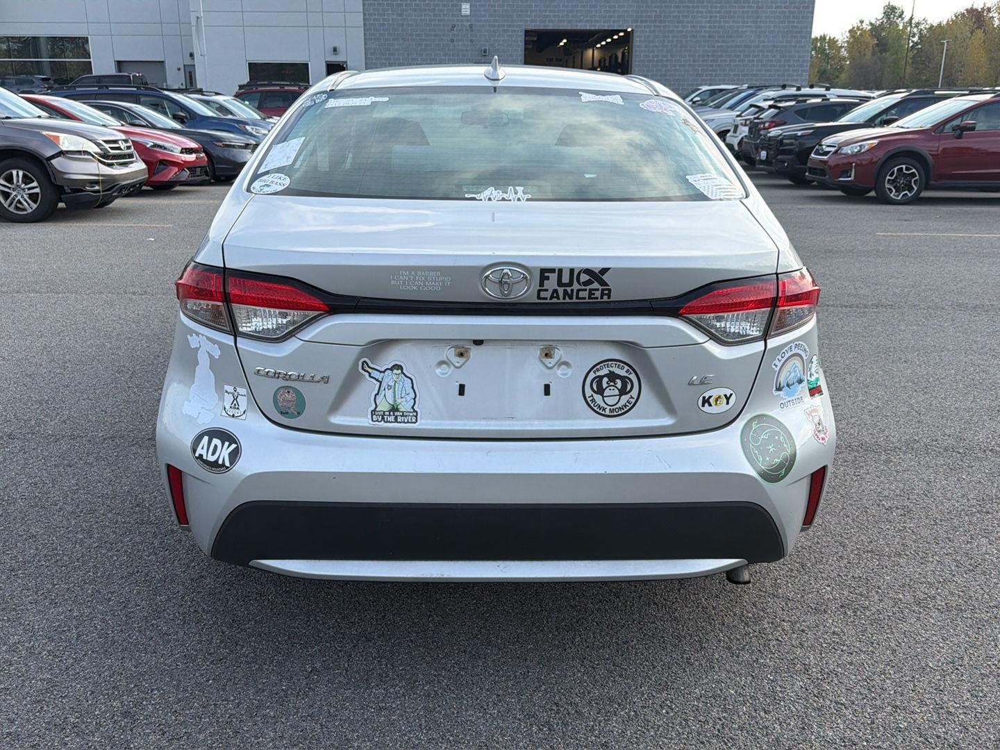 Used 2021 Classic Silver Metallic Toyota LE image 4
