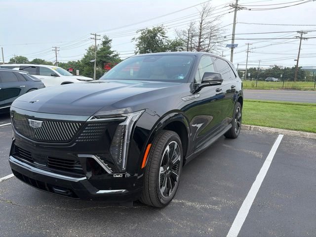 Used 2025 Black Cadillac Sport 2 image 1
