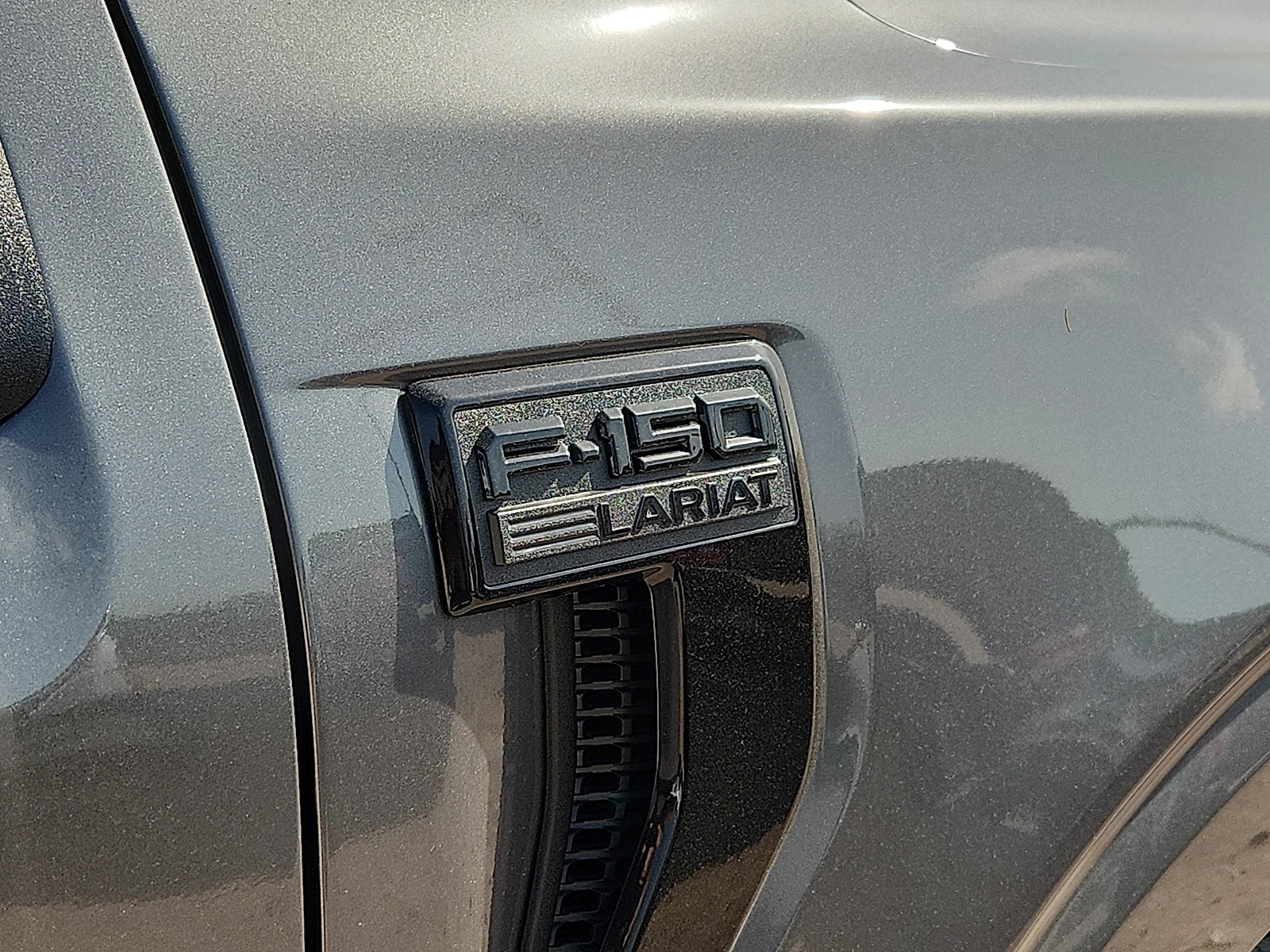 New 2026 Carbonized Gray Metallic Ford Lariat image 10
