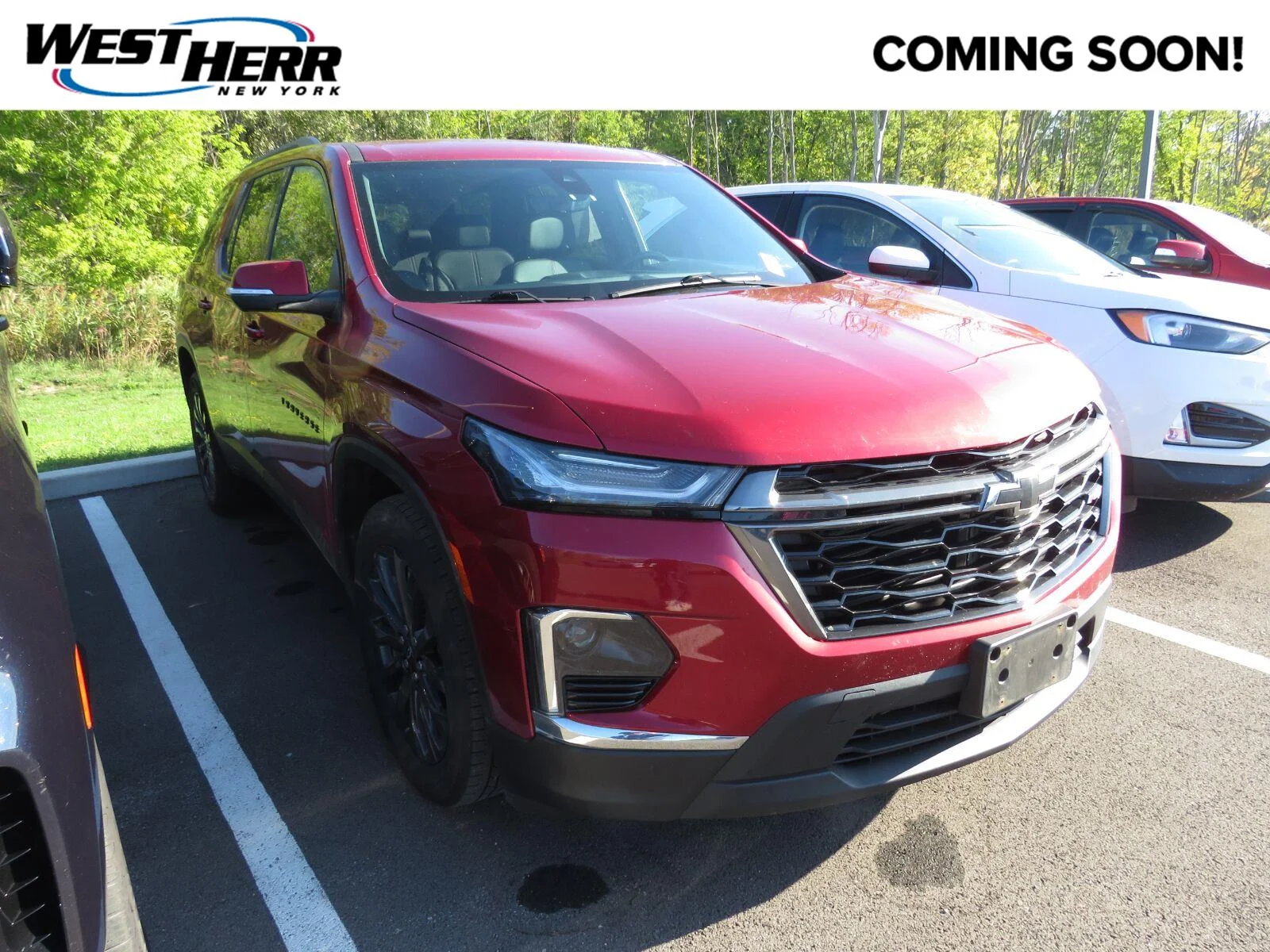 Used 2023 RADIANT RED TINTCOAT Chevrolet RS image 1