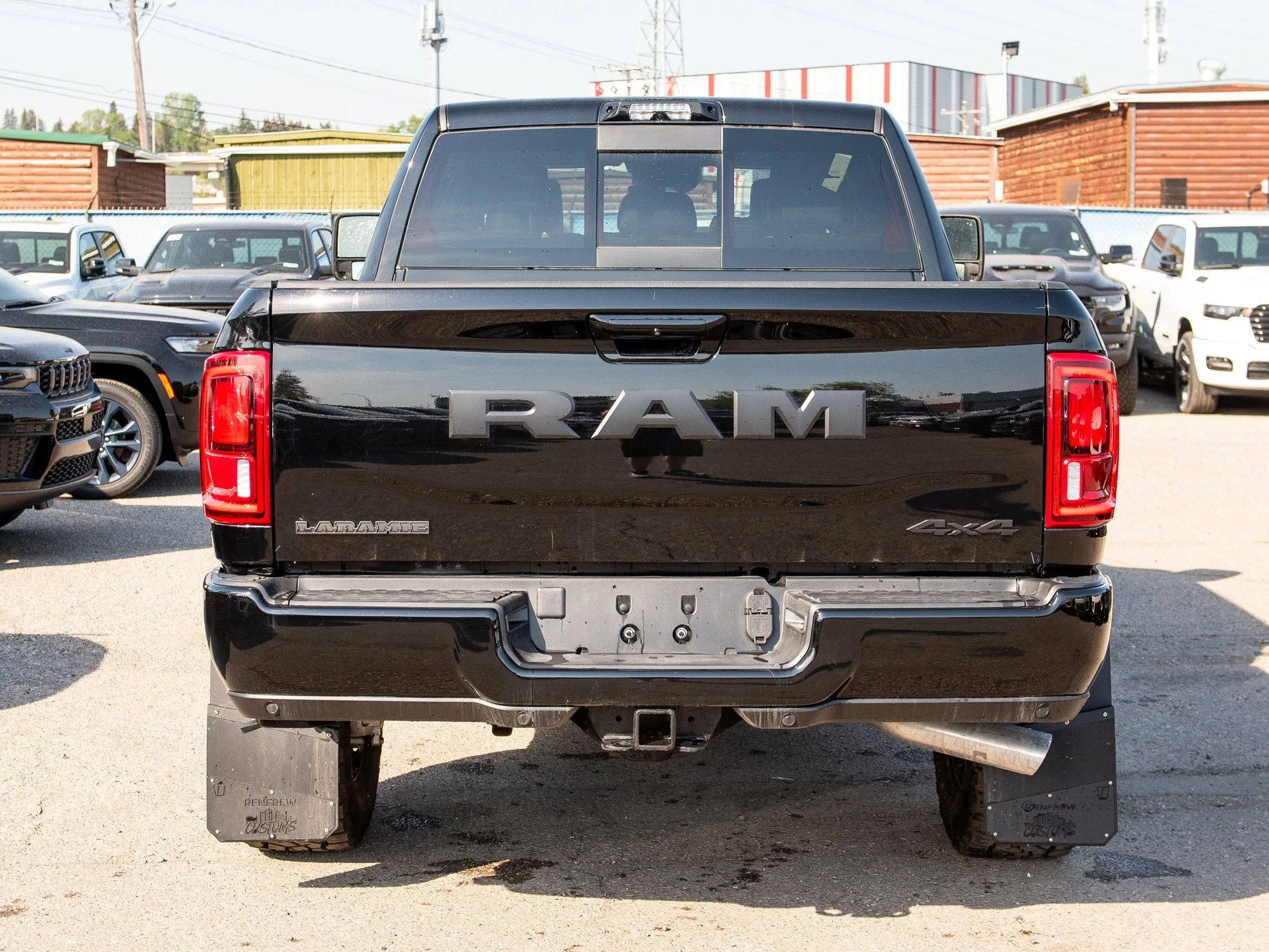 New 2026 Black RAM Laramie* Mega Cab, 2 Inch Lift, 35 Inch Tires, Trigger Industries Mudflaps image 6
