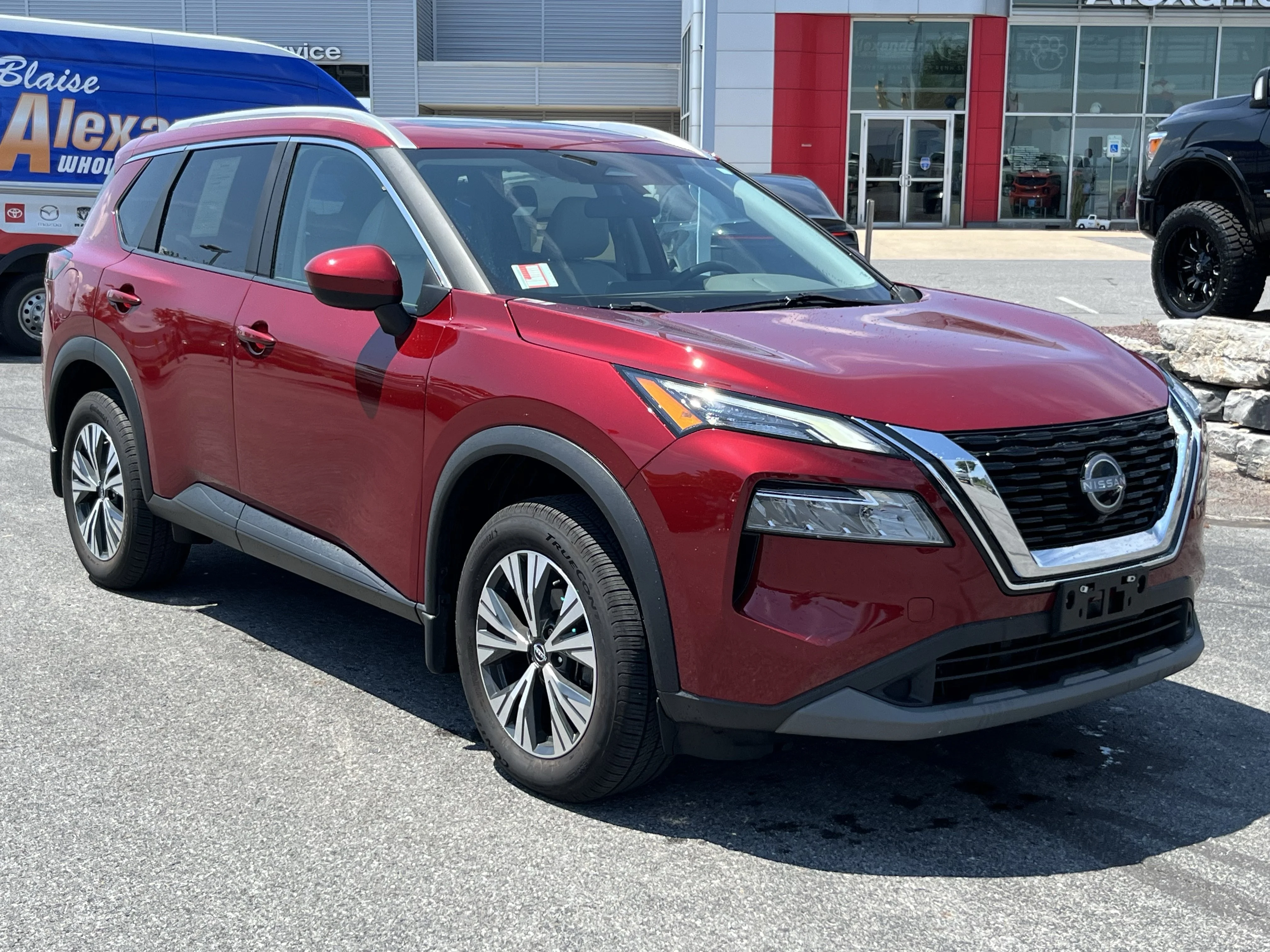 Used 2023 Scarlet Nissan SV image 1