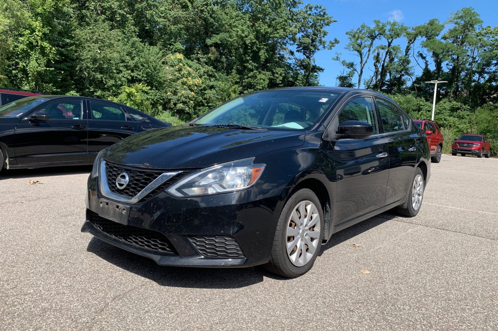 Used 2016 Black Nissan FE+ S image 1