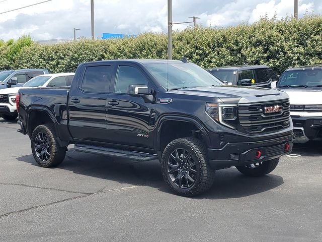 Used 2024 Black GMC AT4 image 1