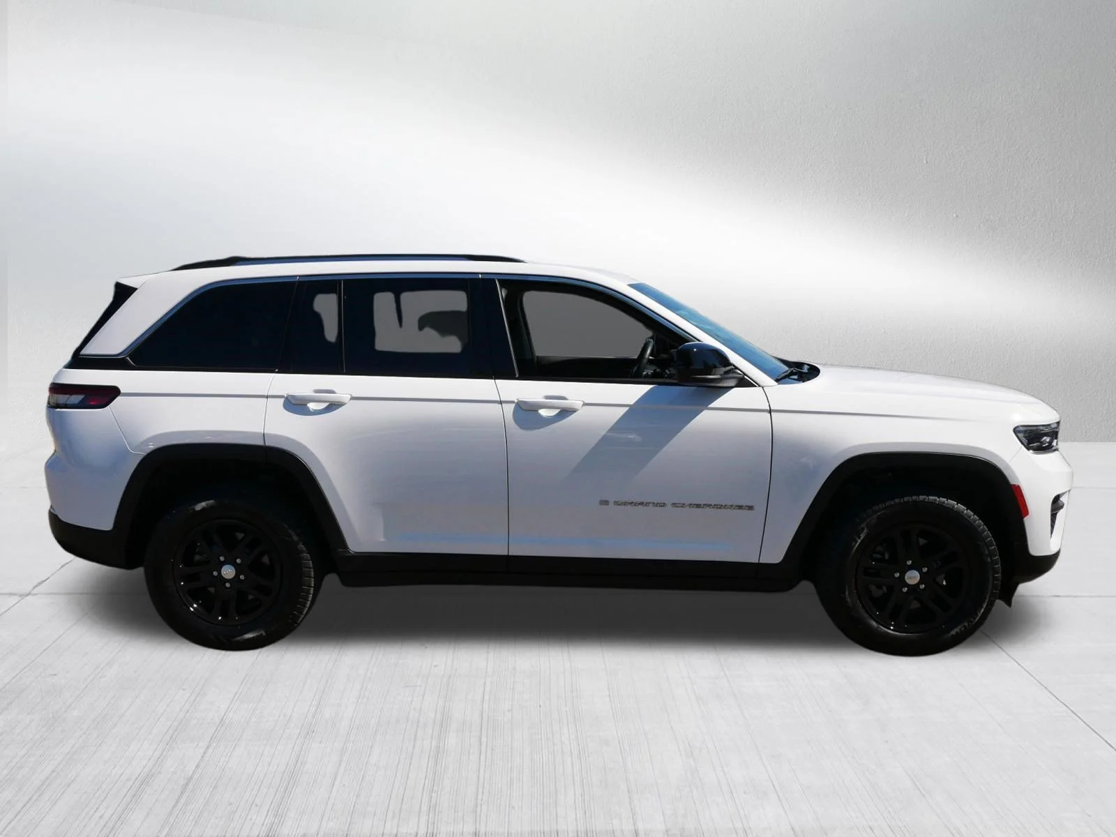Used 2023 Bright White Clearcoat Jeep Laredo image 8