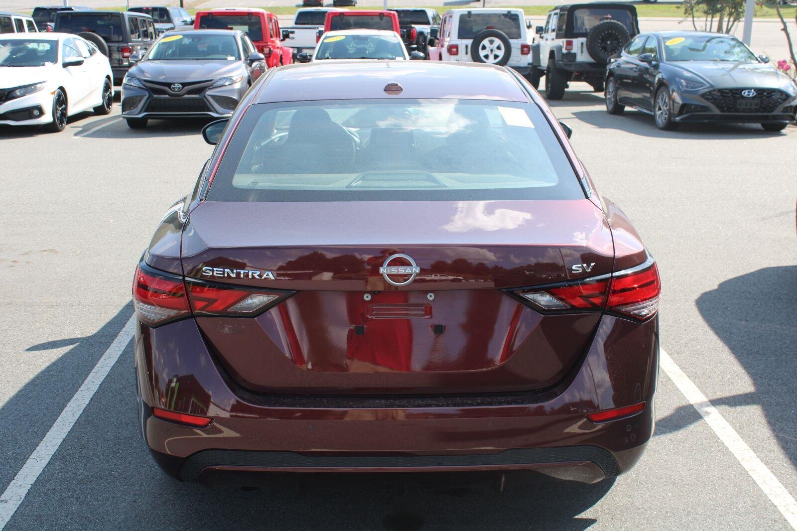 Used 2024 Rosewood Metallic Nissan SV image 7