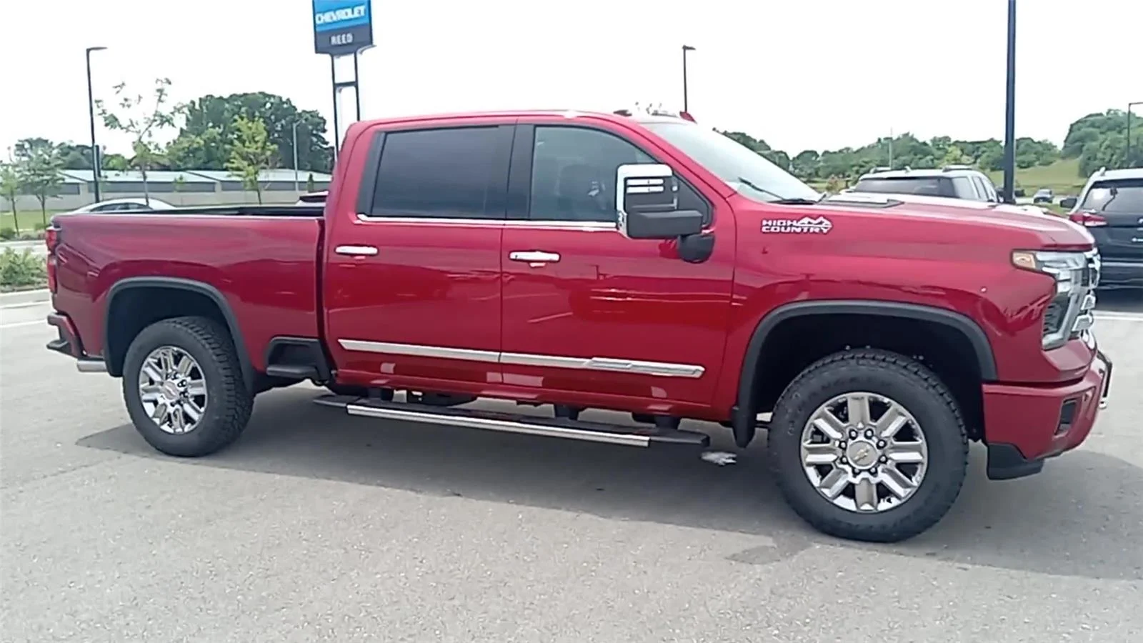 New 2026 Radiant Red Tintcoat Chevrolet High Country image 2