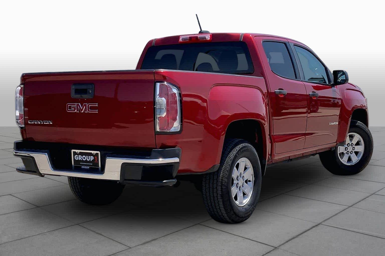 Used 2016 Copper Red Metallic GMC 2WD image 12