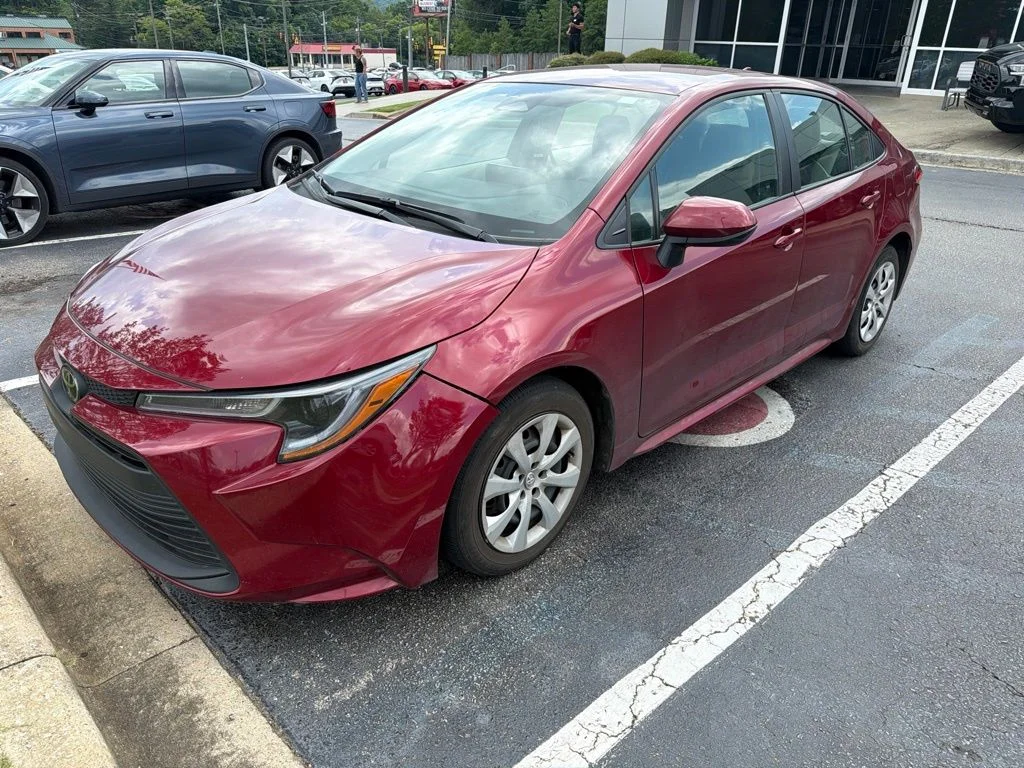 Used 2025 Red Toyota LE image 1