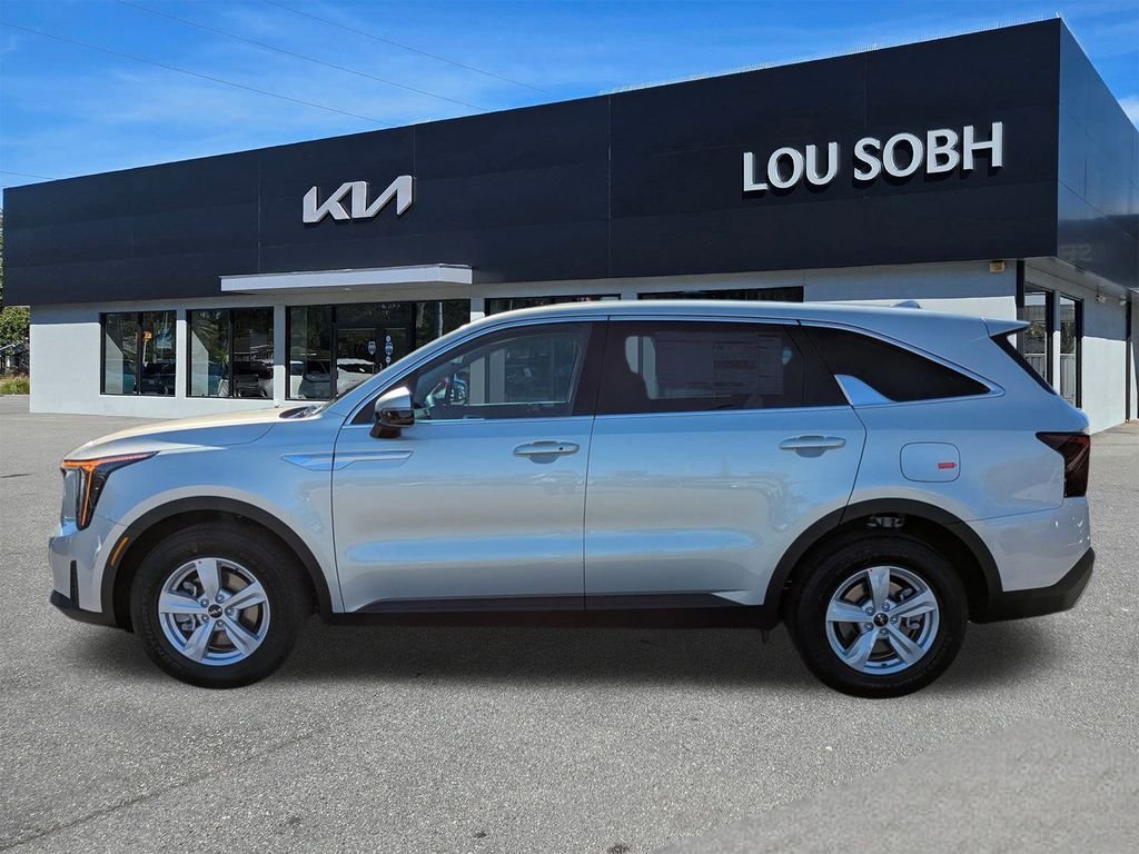 New 2026 Ivory Silver Kia LX image 6