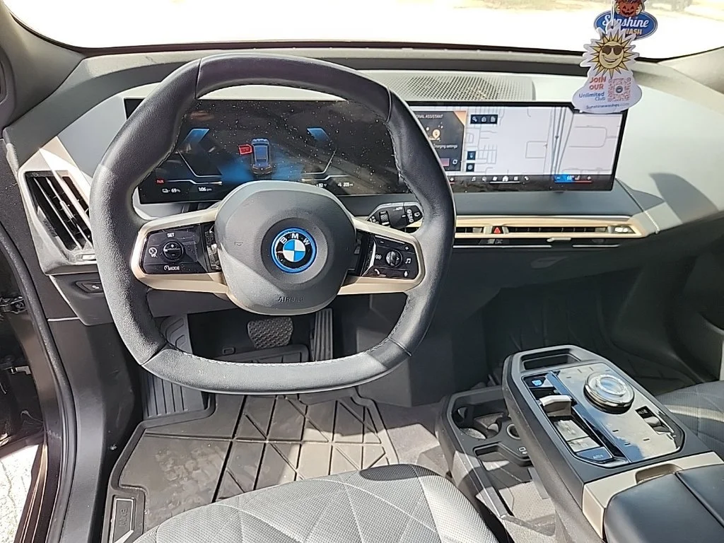 Used 2024 Black Sapphire Metallic BMW xDrive50 image 4
