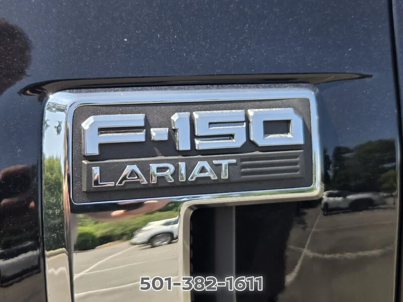 Used 2021 Black Metallic FORD LARIAT 4WD SUPERCREW 5.5