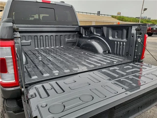 Used 2023 Carbonized Gray Metallic Ford Lariat 4x4 SuperCrew Cab 5.5 ft. box 145 in. WB image 7