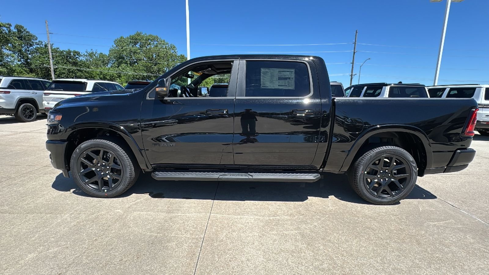 New 2026 Diamond Black Crystal Pearl-Coat Exterior Paint RAM Laramie image 8