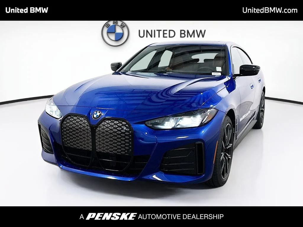 Used 2026 Portimao Blue Metallic BMW eDrive40 image 1