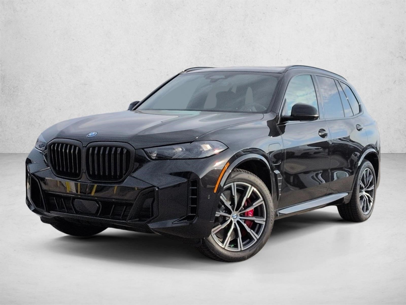 Used 2026 Black Sapphire Metallic BMW xDrive50e image 1