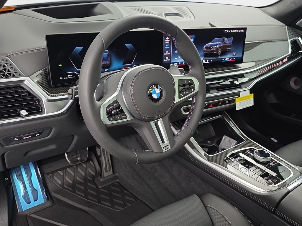 New 2026 Black Sapphire Metallic BMW M60i image 16