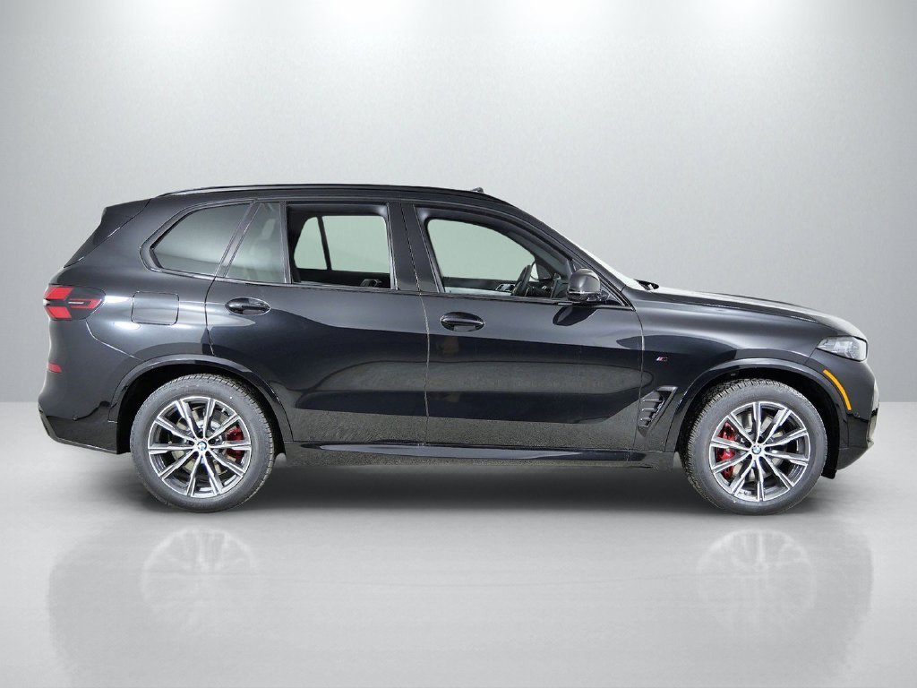 New 2026 Black Sapphire Metallic BMW M60i image 8