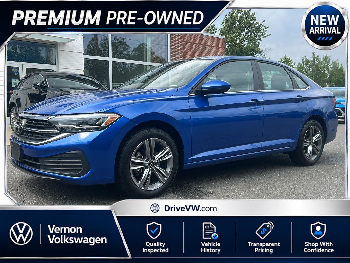 Used 2023 Rising Blue Metallic Volkswagen SE image 1