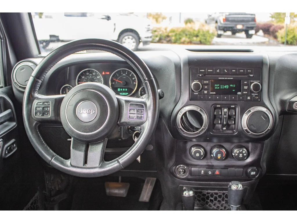 Used 2018 Granite Crystal Metallic Clearcoat Jeep Sport S image 22