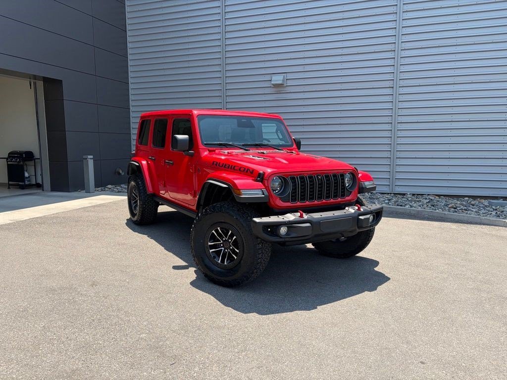 Used 2025 Firecracker Red Clearcoat Jeep Rubicon X image 1
