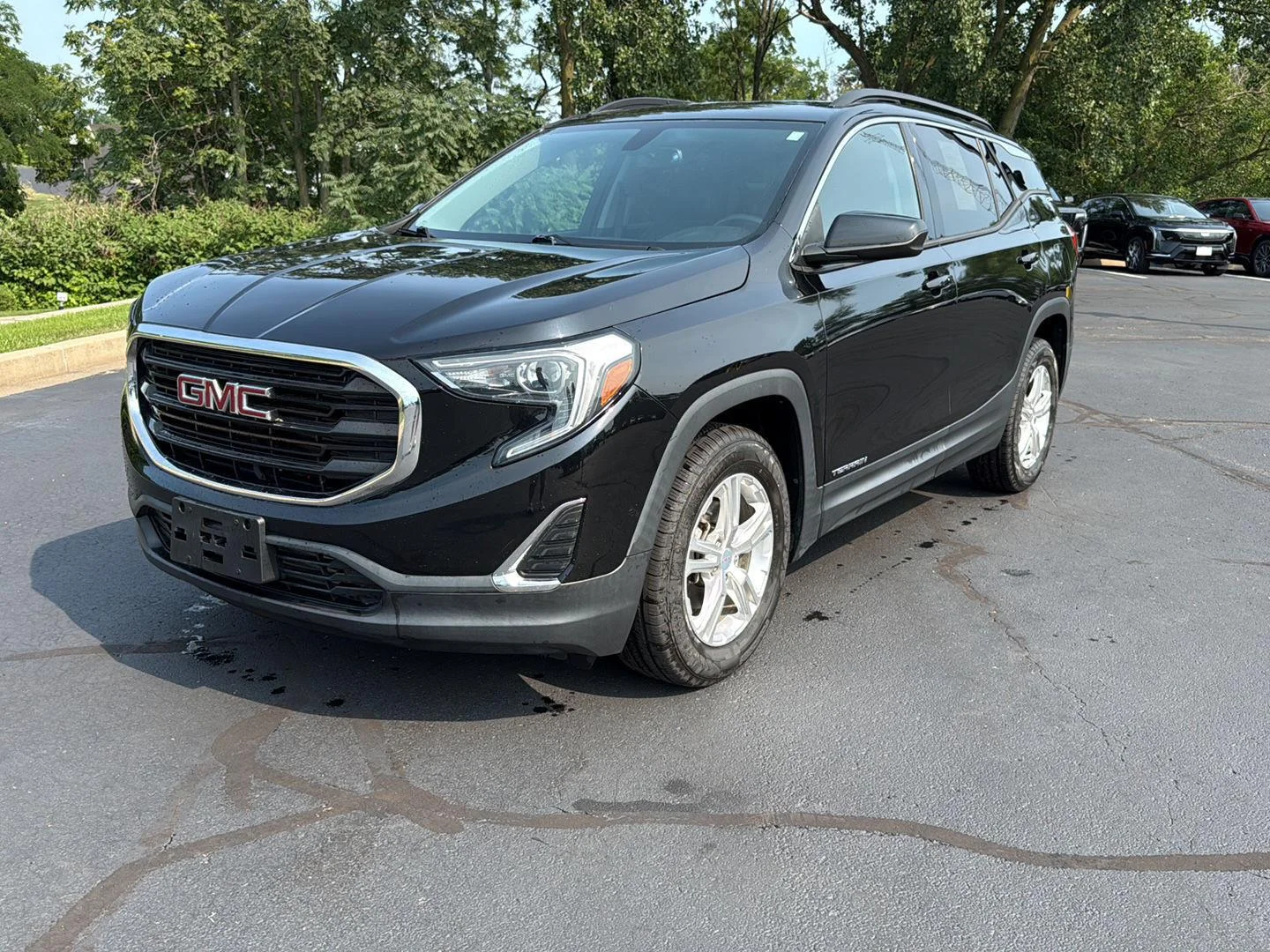 Used 2018 EBONY TWILIGHT METALLIC GMC SLE image 1