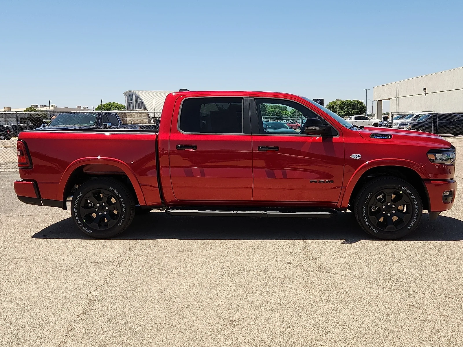 New 2026 Molten Red Pearl-Coat  Paint Ram LONE STAR CREW CAB 4X4 5