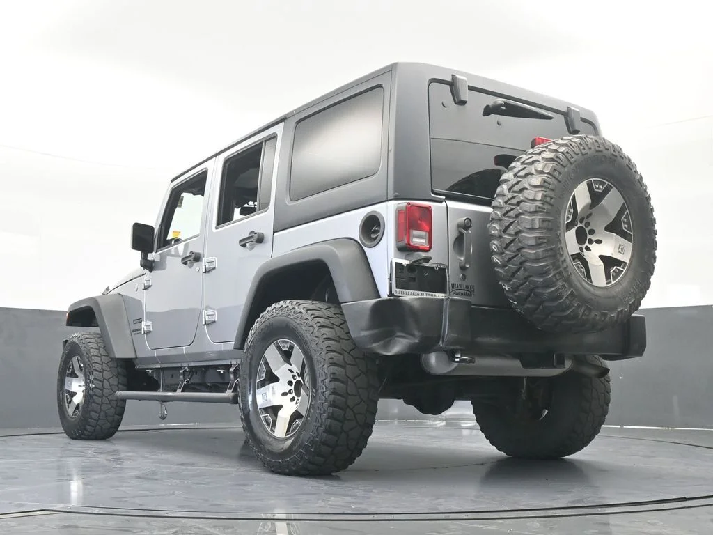 Used 2016 Billet Silver Metallic Clearcoat Jeep Unlimited Sport image 57