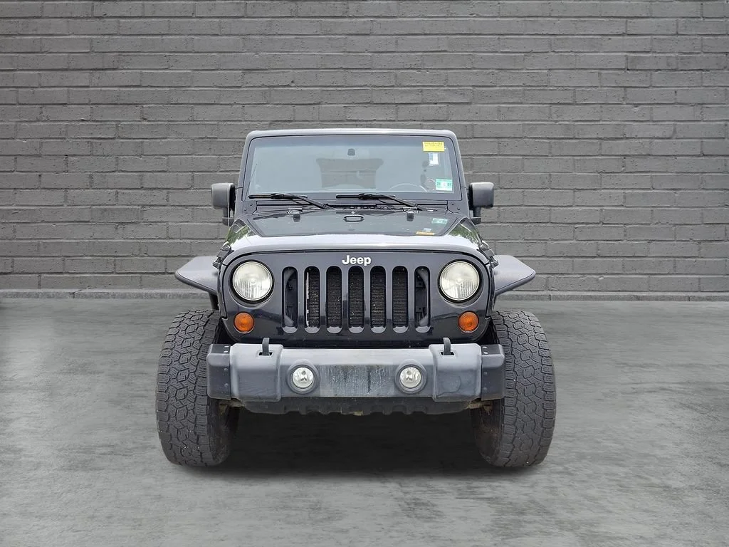 Used 2012 Black Jeep Sport image 2