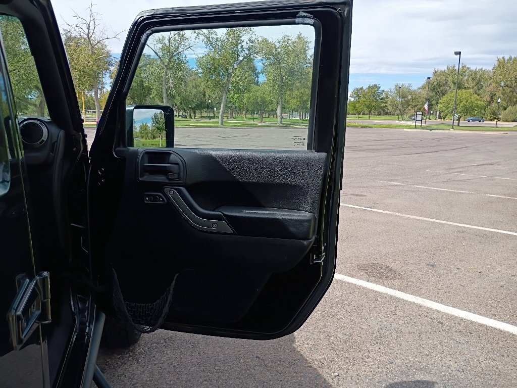 Used 2016 Black Clearcoat Jeep Sport image 9