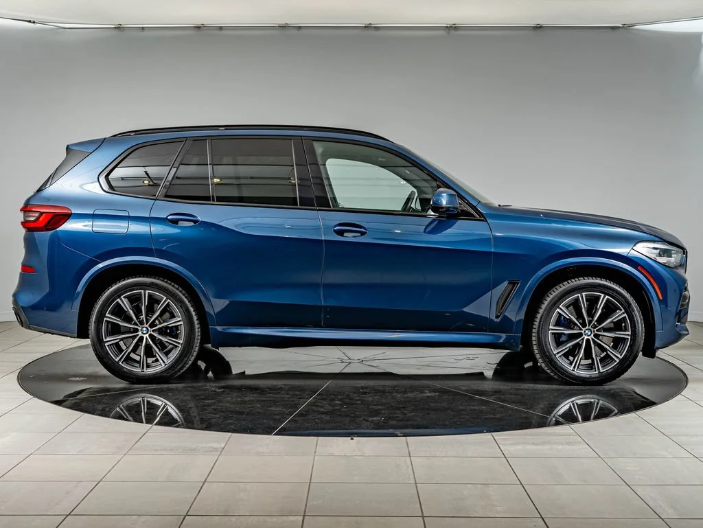 Used 2023 Phytonic Blue Metallic BMW M50i image 4