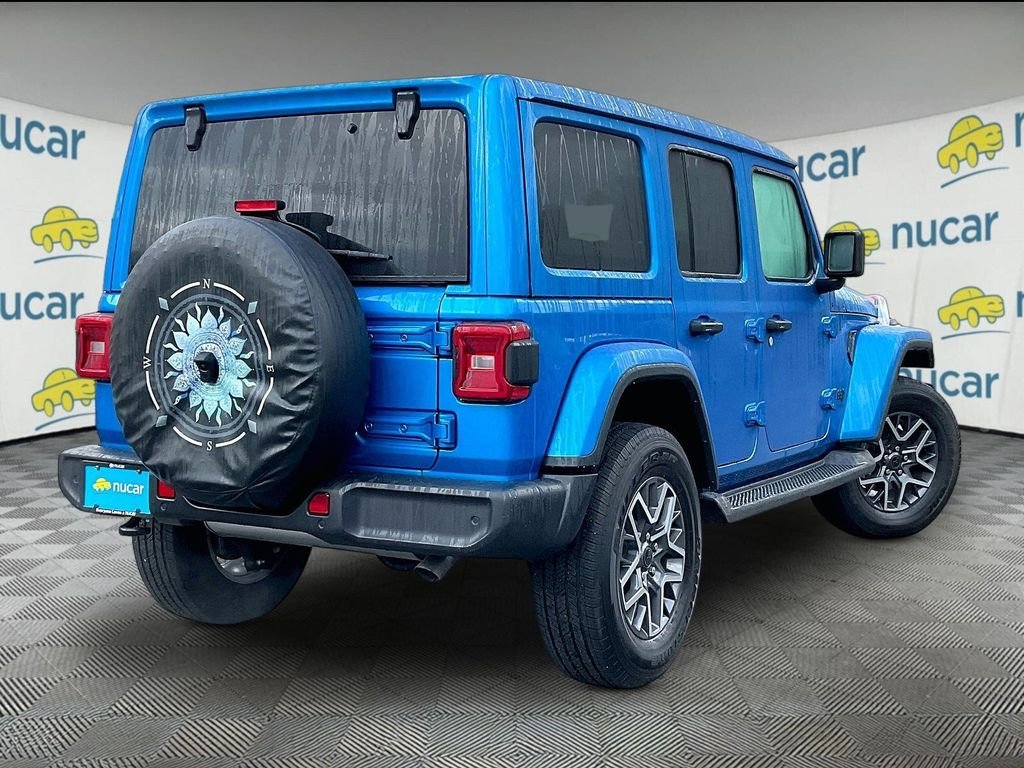 Used 2025 Hydro Blue Pearl Coat Jeep Sahara image 6