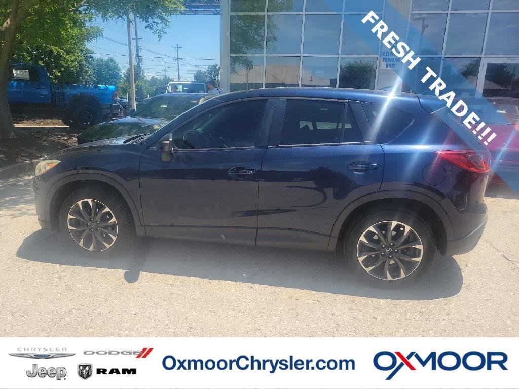 Used 2016 Deep Crystal Blue Mica Mazda Grand Touring image 1